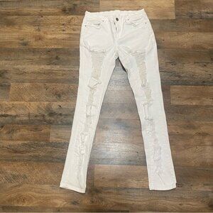Blank NYC distressed white skinny jeans